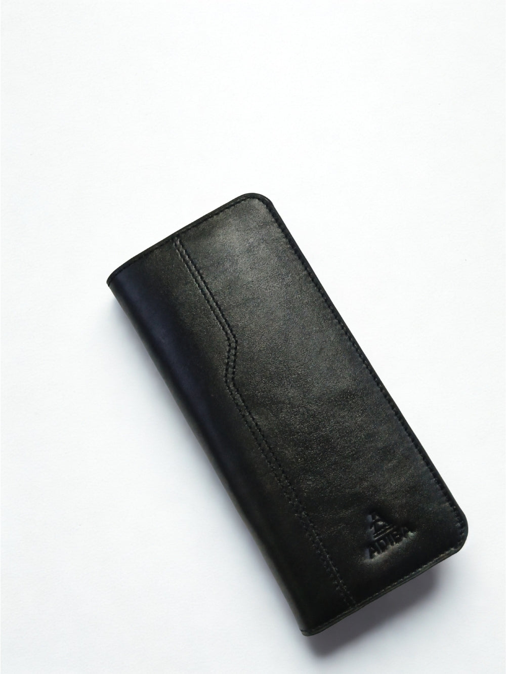 Angled top view of Adiba Leather black genuine leather long wallet with vertical stitch accent
