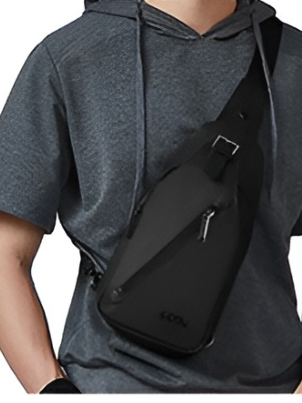 Arctic Hunter XB13006 black sling chest bag worn across chest by model lifestyle view