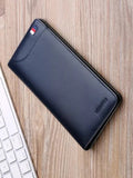 Navy blue genuine cow leather long wallet for men placed flat on a wooden surface