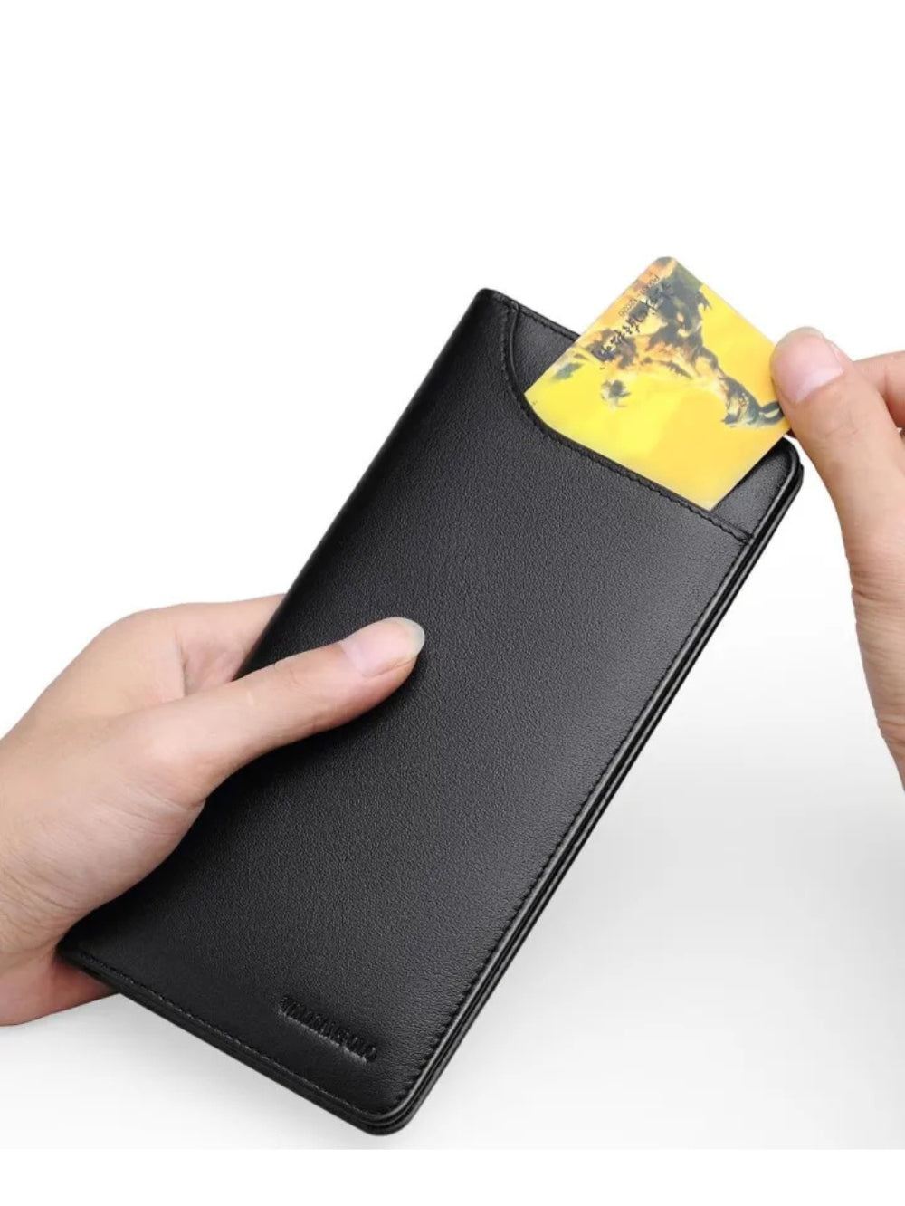 Hand inserting a card into the quick access front slot of a black leather long wallet