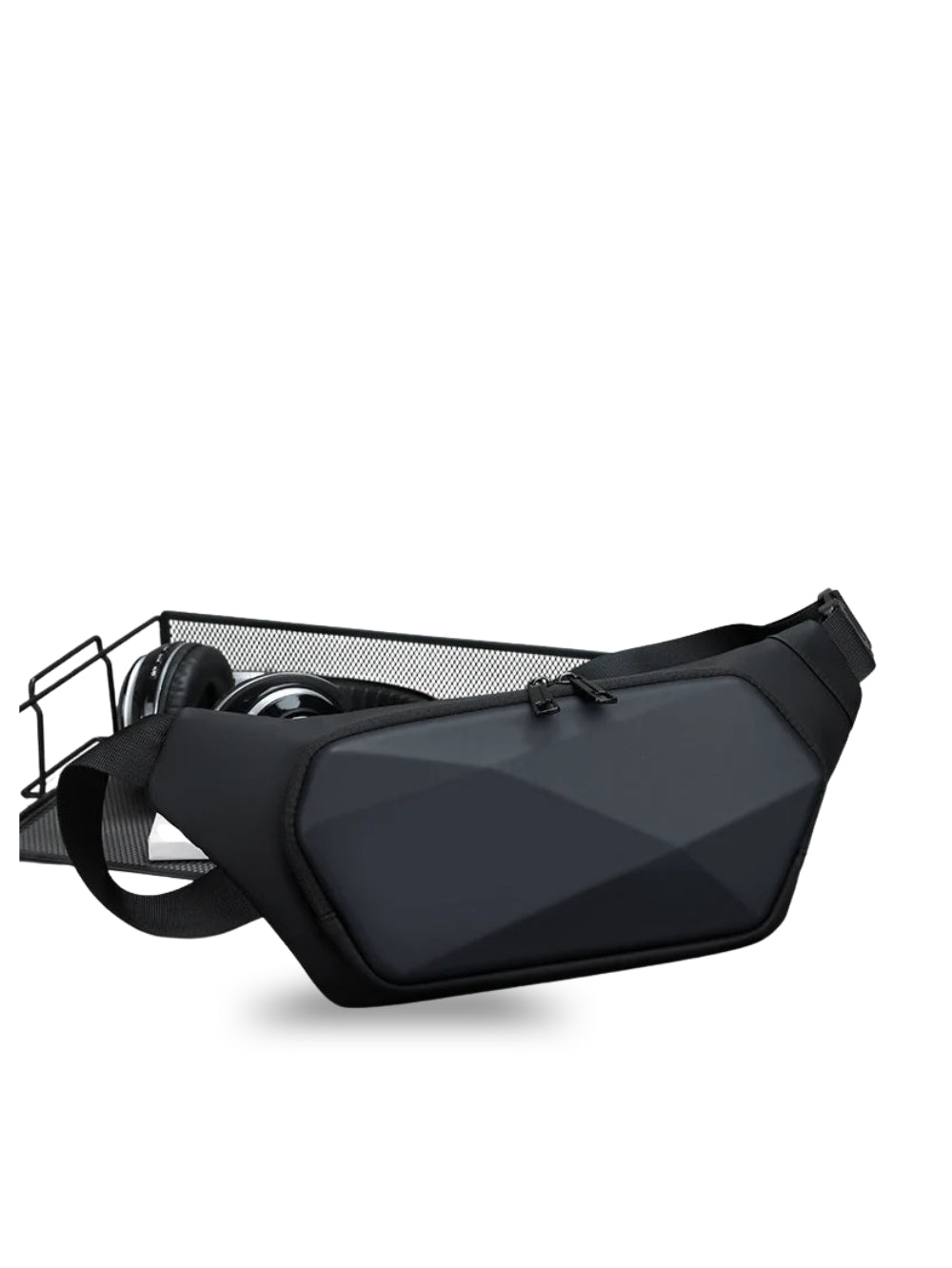 black hard shell geometric sling bag displayed with wireless headphones