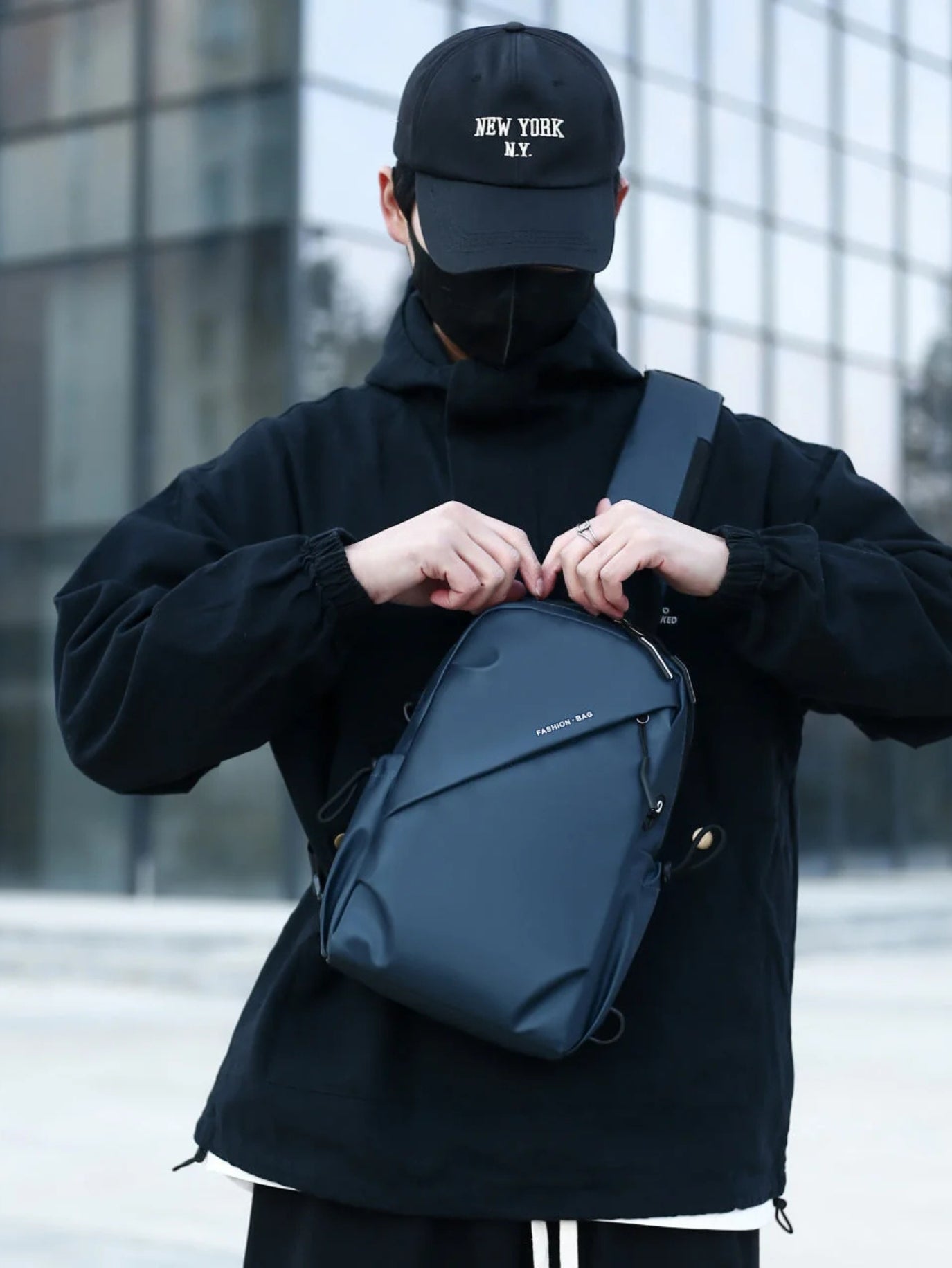 LAVIZAR deep navy crossbody sling chest pack worn by male model