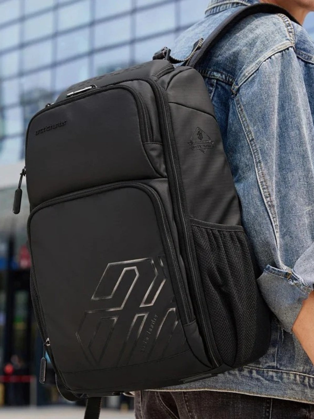 LAVIZAR waterproof anti-theft laptop backpack worn on shoulder model side view