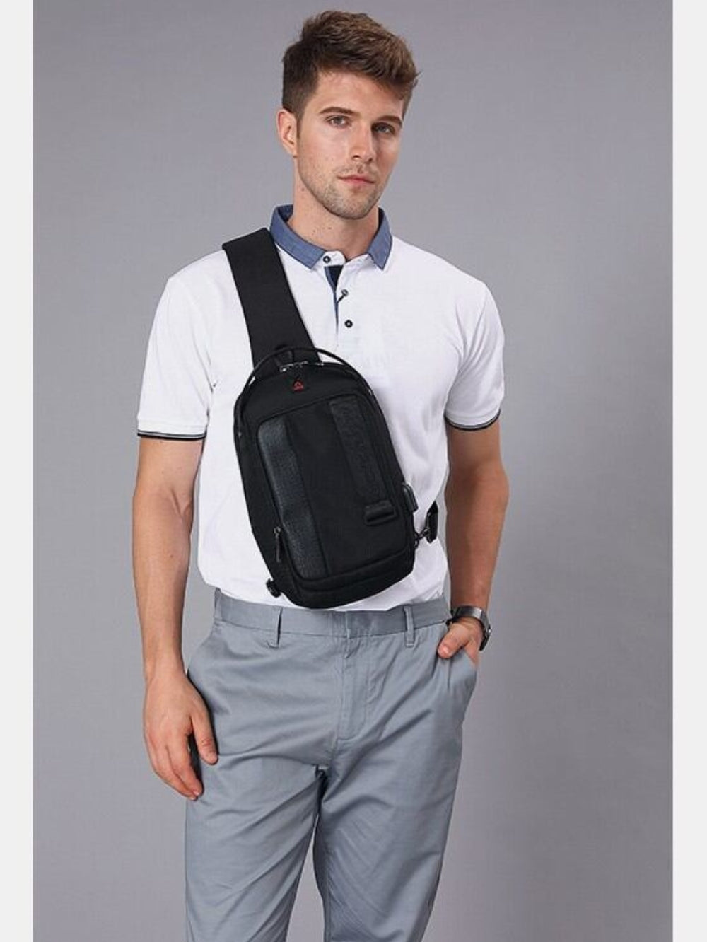 LAVIZAR waterproof crossbody chest bag worn by male model lifestyle view