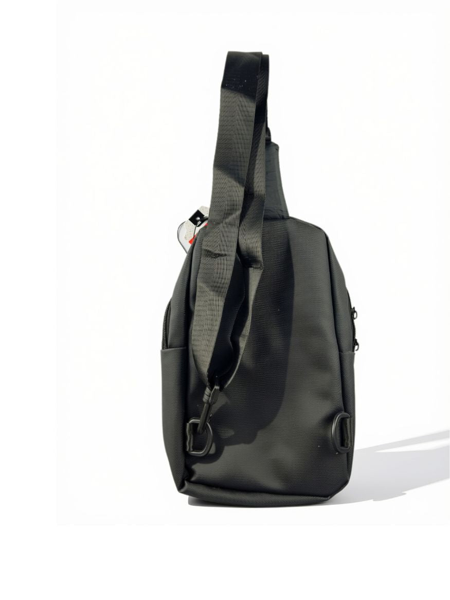 Back view of Shaolong black sling bag showing zip-convertible backpack strap and dual swivel clips