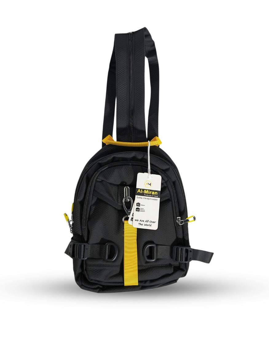 Full view of Tough Warrior black sling bag showing top yellow grab handle and zip-convertible strap